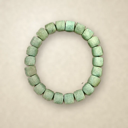 Amazonite beaded bracelet, photographed on warm paper